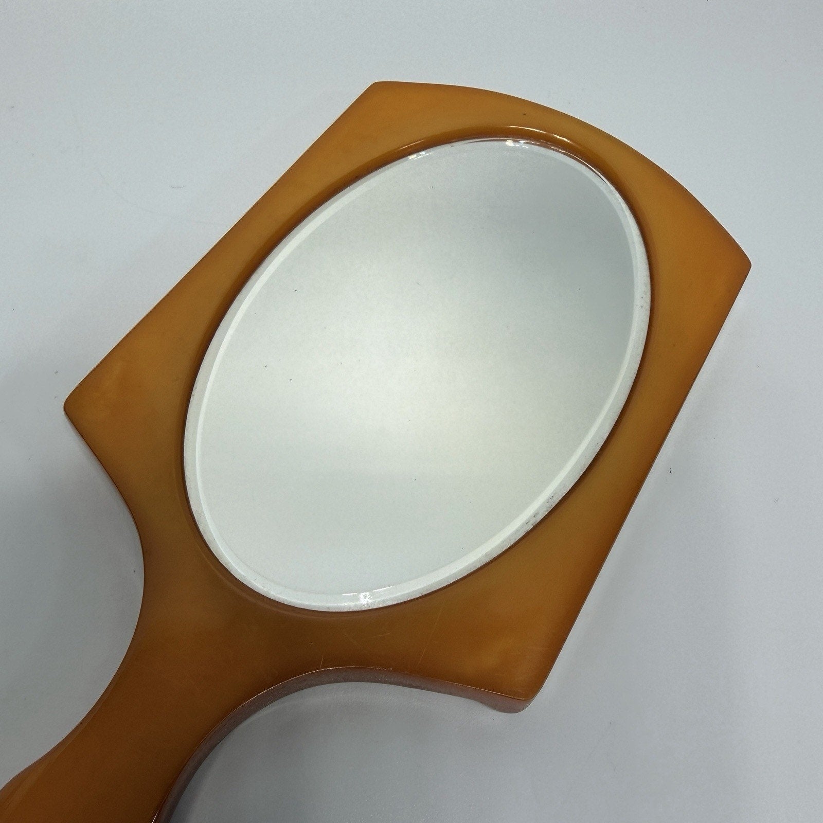 Butterscotch Bakelite Beveled Glass Handheld Vanity Mirror Elizabeth Arden 12"