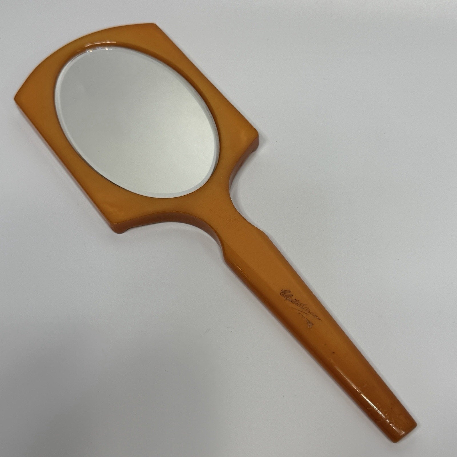 Butterscotch Bakelite Beveled Glass Handheld Vanity Mirror Elizabeth Arden 12"